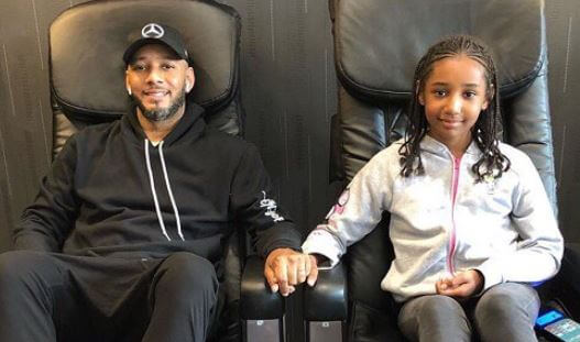 Nicole Dean with her father Swizz Beatz.